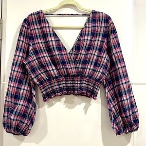 Zara cropped shirt.  It has an elastic waist with ballon sleeve shirt.